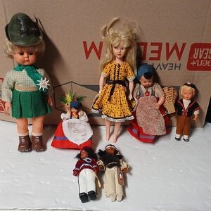 Vintage Doll Set Lot Of 7 with Green, Yellow, and Red Outfits